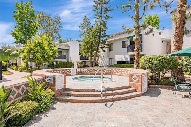 18645 Hatteras St Unit 203, Tarzana, CA 91356 - view of swimming pool with a community hot tub