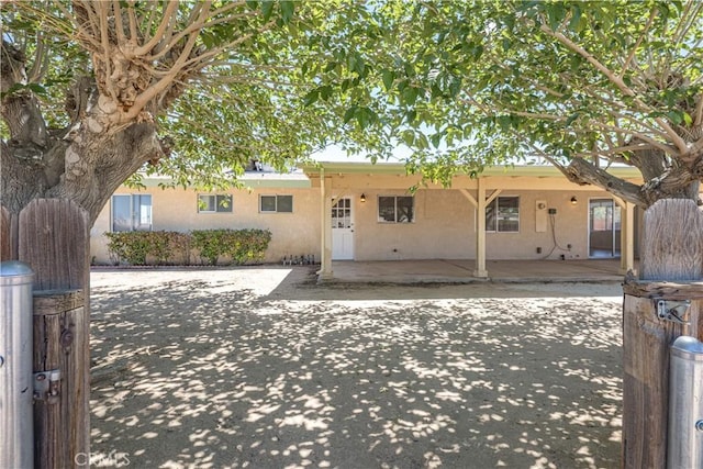 15156 Kinai Rd, Apple Valley, CA 92307 - view of front facade with stucco siding and a patio area