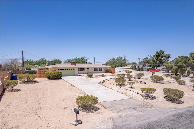 15156 Kinai Rd, Apple Valley, CA 92307 - ranch-style home with an attached garage and concrete driveway
