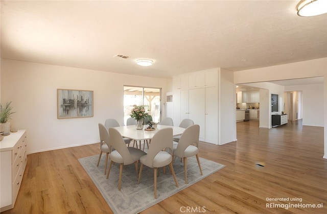 15156 Kinai Rd, Apple Valley, CA 92307 - dining space with light wood-style flooring