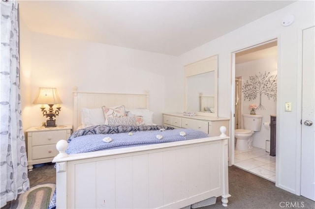 5538 Las Virgenes Rd Unit 142, Calabasas, CA 91302 - bedroom with dark colored carpet and ensuite bath
