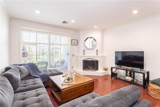 5538 Las Virgenes Rd Unit 142, Calabasas, CA 91302 - living room featuring wood finished floors, ornamental molding, a brick fireplace, and recessed lighting