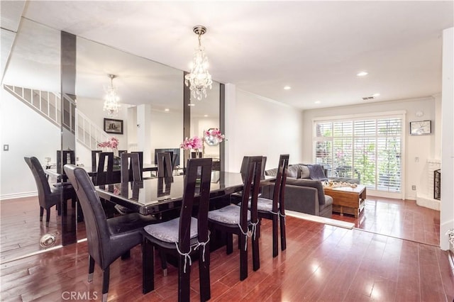 5538 Las Virgenes Rd Unit 142, Calabasas, CA 91302 - dining area featuring a chandelier, wood finished floors, baseboards, crown molding, and recessed lighting