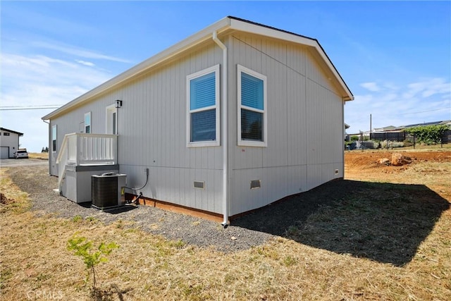5560 Keith Rd, Paradise, CA 95969 - view of side of home featuring crawl space and central air condition unit