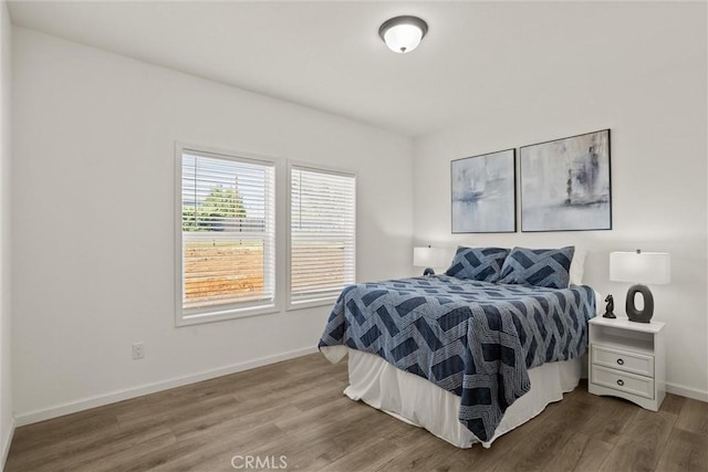 5560 Keith Rd, Paradise, CA 95969 - bedroom with wood finished floors and baseboards