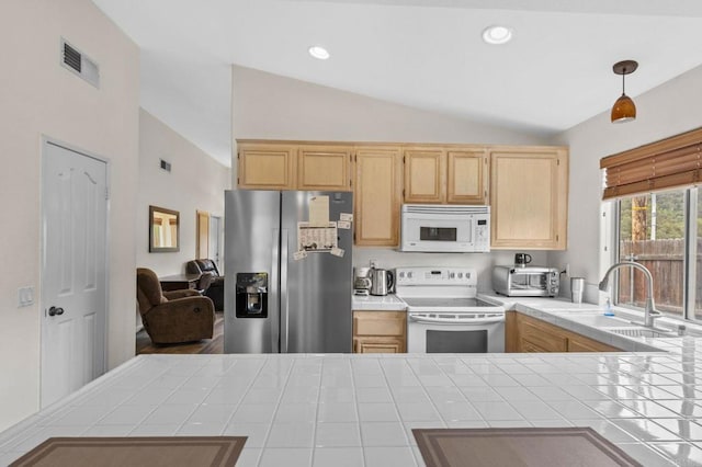 14204 Legacy Ln, El Cajon, CA 92021 - kitchen featuring white appliances, tile counters, light brown cabinetry, a sink, and lofted ceiling
