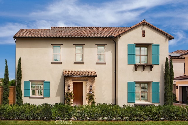 116 Rimstone, Irvine, CA 92618 - mediterranean / spanish-style house featuring a tile roof and stucco siding