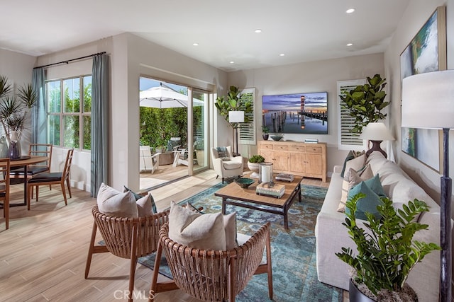 116 Rimstone, Irvine, CA 92618 - living room featuring healthy amount of natural light, light wood-type flooring, and recessed lighting