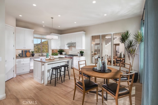 116 Rimstone, Irvine, CA 92618 - dining area with recessed lighting and light wood-style floors
