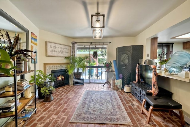 1080 Buena Pl, Carlsbad, CA 92008 - living area with a fireplace and brick flooring