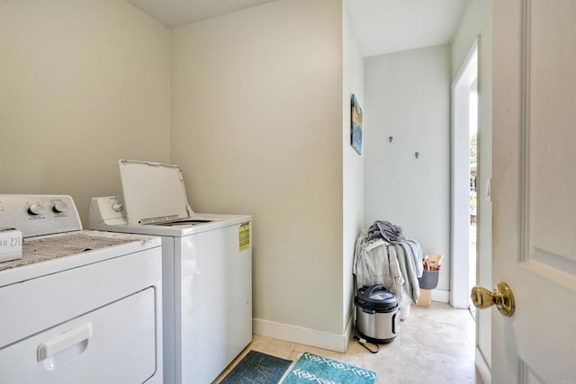 1080 Buena Pl, Carlsbad, CA 92008 - laundry room featuring washing machine and dryer and baseboards