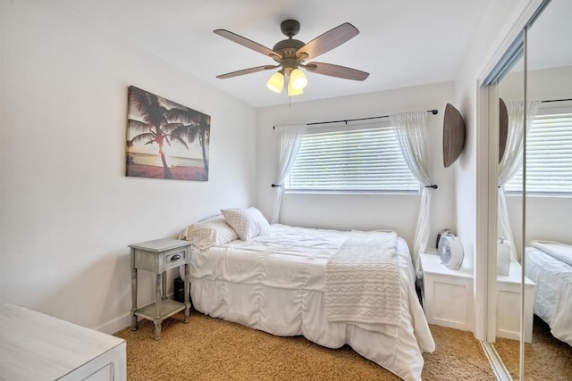 1080 Buena Pl, Carlsbad, CA 92008 - bedroom with a closet, light carpet, a ceiling fan, and baseboards