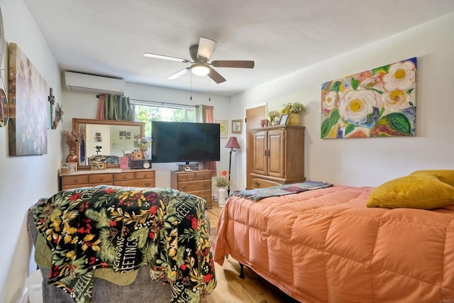 1080 Buena Pl, Carlsbad, CA 92008 - bedroom with an AC wall unit, light wood-style flooring, and a ceiling fan
