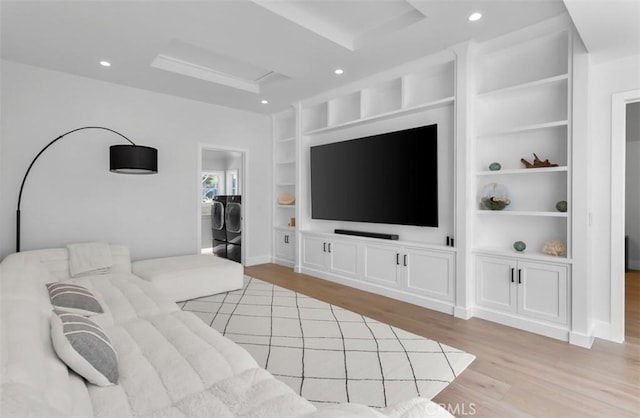 2401 Bayshore Dr, Newport Beach, CA 92663 - living area with light wood-type flooring, built in shelves, recessed lighting, separate washer and dryer, and baseboards