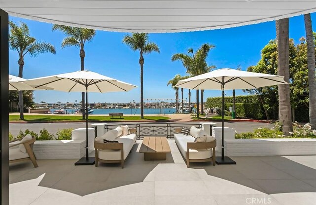 2401 Bayshore Dr, Newport Beach, CA 92663 - view of patio with a water view and outdoor lounge area