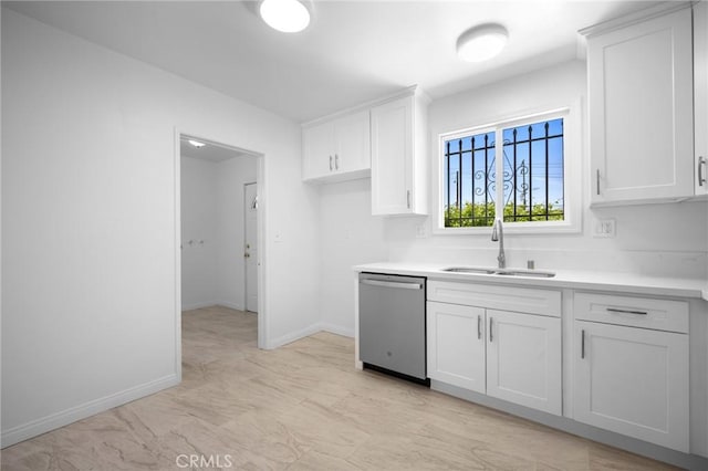 2931 W 137th St, Gardena, CA 90249 - kitchen with dishwasher, a sink, light countertops, and white cabinetry