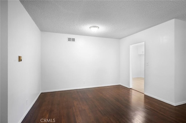 2931 W 137th St, Gardena, CA 90249 - unfurnished room with wood finished floors, a textured ceiling, and baseboards