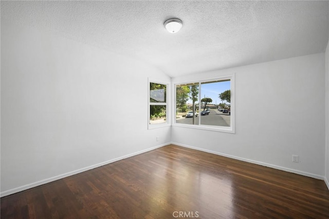 2931 W 137th St, Gardena, CA 90249 - empty room with wood finished floors, lofted ceiling, a textured ceiling, and baseboards