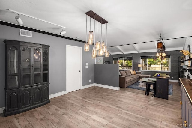 9739 Carta Ln, El Cajon, CA 92021 - living room featuring a chandelier, light wood-style floors, baseboards, and track lighting