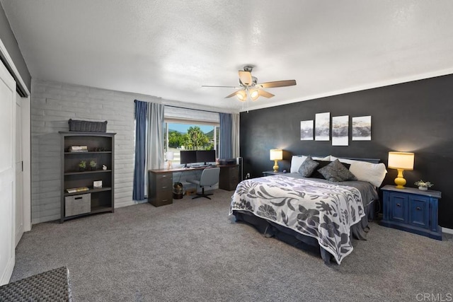 9739 Carta Ln, El Cajon, CA 92021 - carpeted bedroom with a desk, a ceiling fan, and a closet