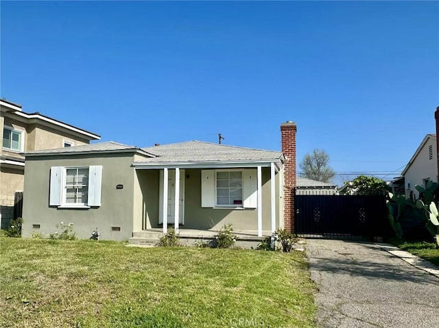8739 Ralph St, Rosemead, CA 91770 - bungalow with a porch, stucco siding, a front lawn, a chimney, and a shingled roof