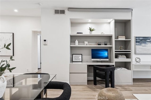 450 San Vicente Blvd Unit 203, Santa Monica, CA 90402 - living room with light wood-style floors, a desk, built in features, and recessed lighting