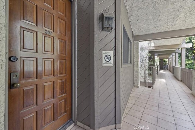 450 San Vicente Blvd Unit 203, Santa Monica, CA 90402 - view of exterior entry featuring covered porch