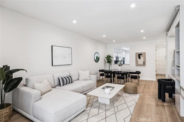 450 San Vicente Blvd Unit 203, Santa Monica, CA 90402 - living area with recessed lighting, light wood-style floors, and baseboards