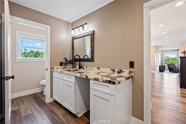 1534 Via Arroyo, Paso Robles, CA 93446 - bathroom featuring toilet, vanity, wood finished floors, baseboards, and recessed lighting
