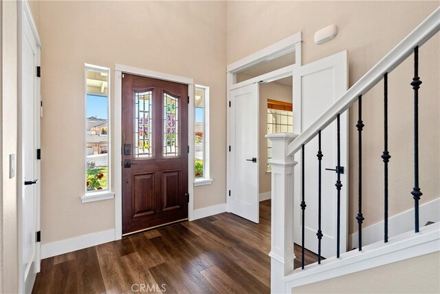 1534 Via Arroyo, Paso Robles, CA 93446 - foyer featuring stairway, dark wood-style floors, and baseboards