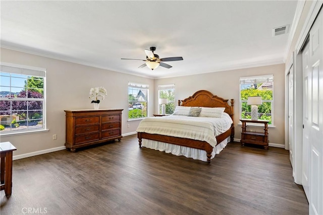 1534 Via Arroyo, Paso Robles, CA 93446 - bedroom featuring multiple windows, dark wood finished floors, crown molding, and a closet