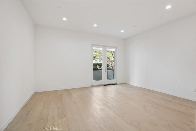 1746 Garfield Pl Unit 101, Los Angeles, CA 90028 - unfurnished room featuring light wood-style floors, recessed lighting, and baseboards