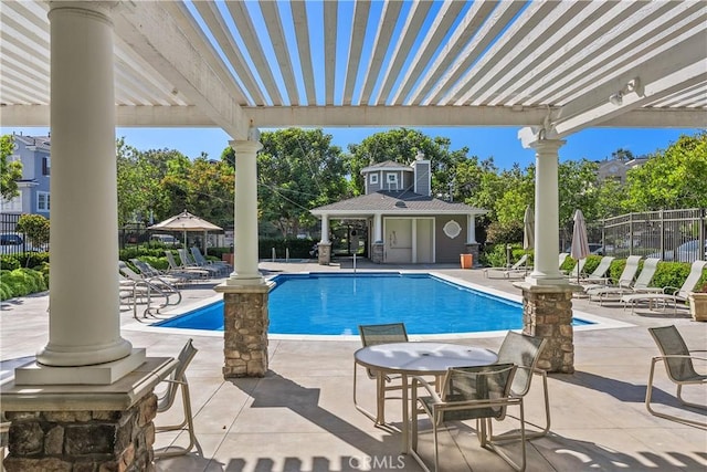 6249 Pacific Pointe Dr Unit 16, Huntington Beach, CA 92648 - community pool featuring a patio and an outbuilding