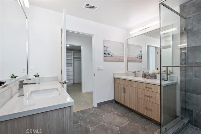 1746 Garfield Pl Unit 203, Los Angeles, CA 90028 - full bathroom featuring vanity, a shower stall, and tile patterned flooring