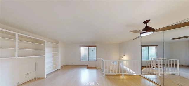 4660 Coldwater Canyon Ave Unit 4, Studio City, CA 91604 - empty room with plenty of natural light, wood finished floors, and ceiling fan