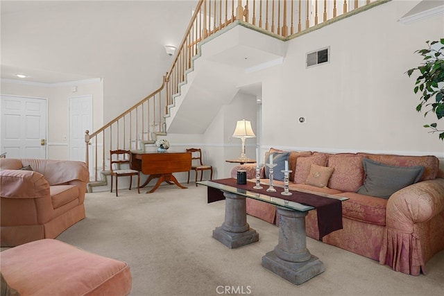 15058 Providence Ln, North Hills, CA 91343 - living room featuring carpet floors, stairs, a high ceiling, and ornamental molding