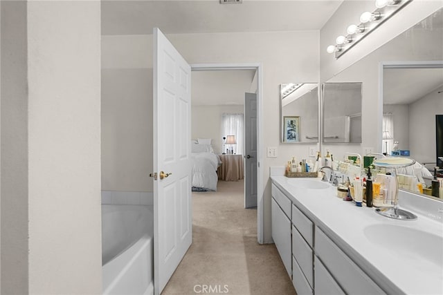 15058 Providence Ln, North Hills, CA 91343 - bathroom featuring connected bathroom, double vanity, and a bathtub