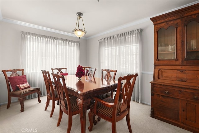 15058 Providence Ln, North Hills, CA 91343 - dining space featuring ornamental molding and light colored carpet
