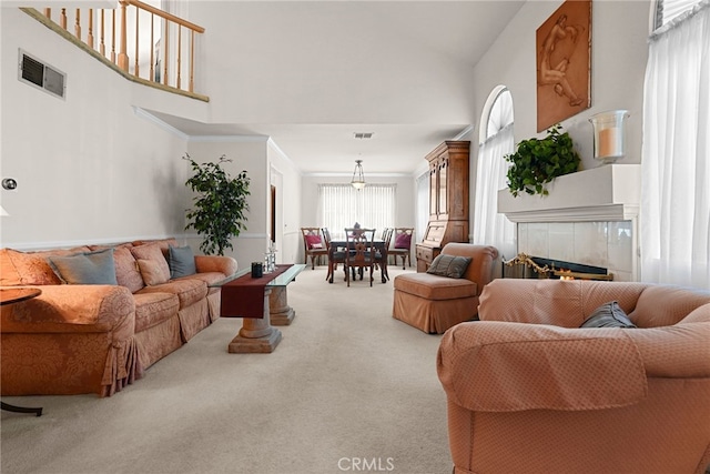 15058 Providence Ln, North Hills, CA 91343 - carpeted living area with high vaulted ceiling and a tile fireplace