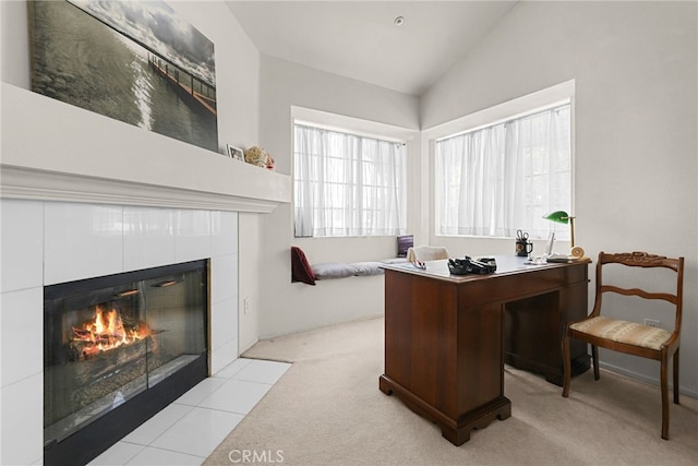 15058 Providence Ln, North Hills, CA 91343 - office area with a fireplace, vaulted ceiling, light colored carpet, and healthy amount of natural light