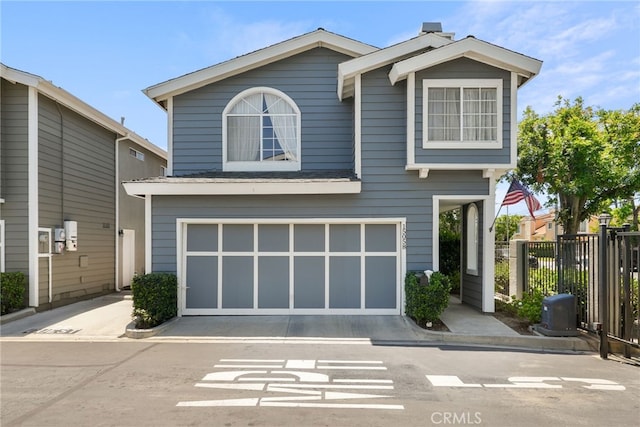 15058 Providence Ln, North Hills, CA 91343 - view of front facade with a garage and concrete driveway