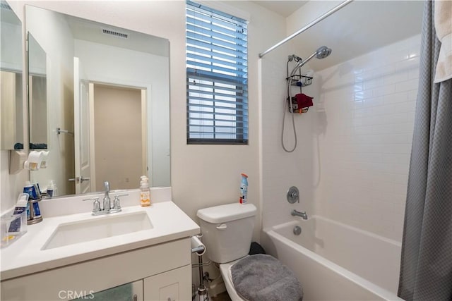 956 W Clover Ave, Rialto, CA 92376 - bathroom featuring shower / bath combo, vanity, and toilet