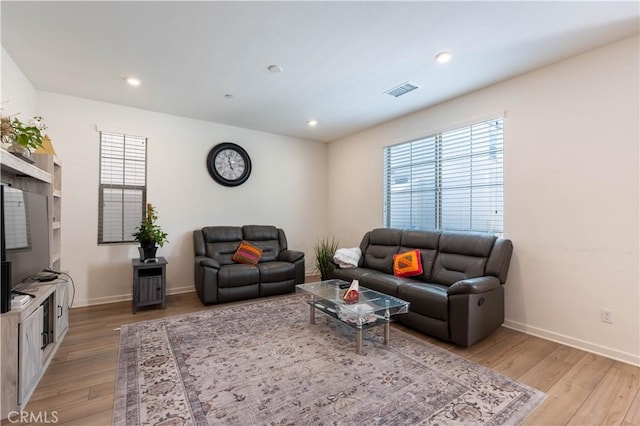 956 W Clover Ave, Rialto, CA 92376 - living area featuring light wood finished floors, baseboards, and recessed lighting