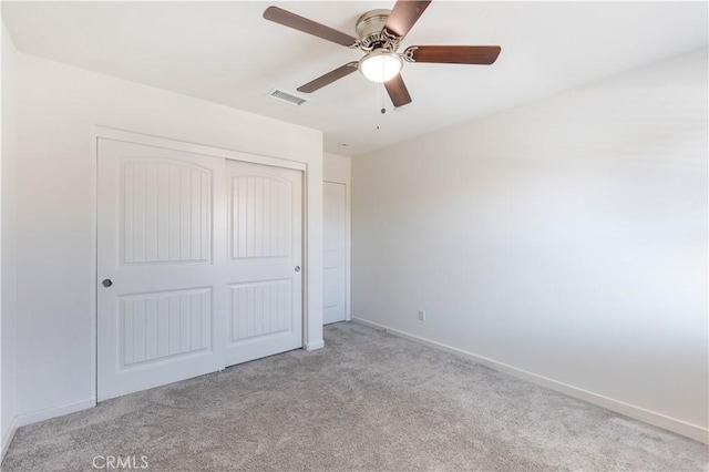 956 W Clover Ave, Rialto, CA 92376 - unfurnished bedroom with carpet, baseboards, a closet, and ceiling fan