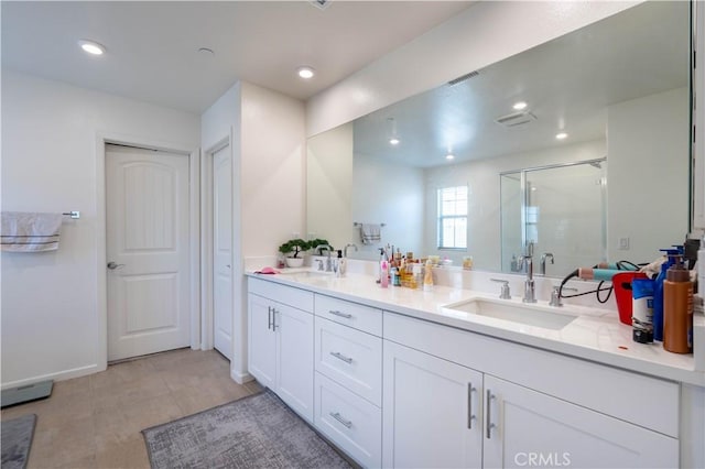 956 W Clover Ave, Rialto, CA 92376 - full bath with double vanity, a shower stall, and recessed lighting