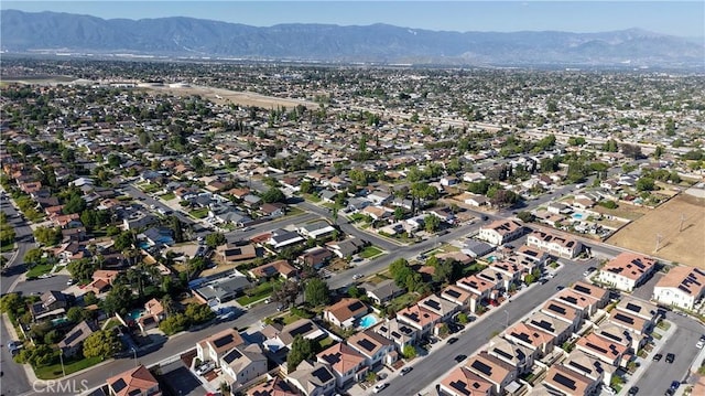 956 W Clover Ave, Rialto, CA 92376 - aerial overview of property's location featuring a mountain backdrop