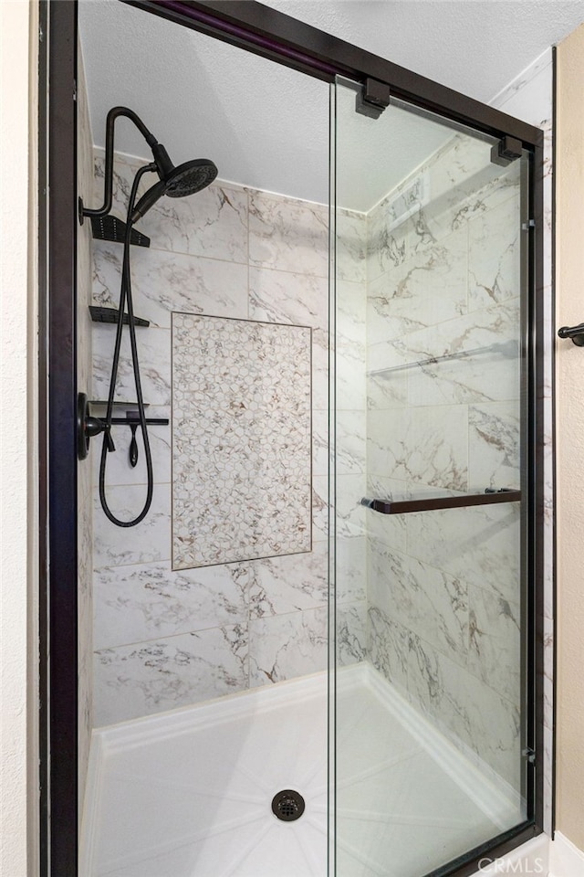 8729 Hillside Rd, Rancho Cucamonga, CA 91701 - bathroom featuring a marble finish shower