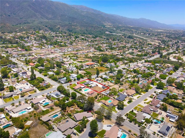 8729 Hillside Rd, Rancho Cucamonga, CA 91701 - aerial view of property's location with a mountainous background and property boundaries highlighted
