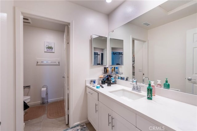 980 W Jasmine Way, Rialto, CA 92376 - bathroom with vanity, toilet, baseboards, and tile patterned floors