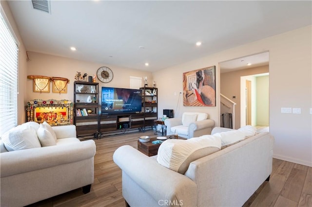 980 W Jasmine Way, Rialto, CA 92376 - living room featuring wood finished floors, recessed lighting, and baseboards